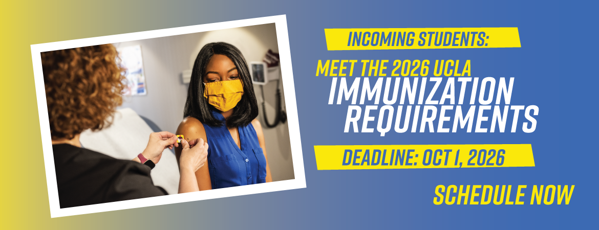 Photo of girl getting a vaccine with a mask on